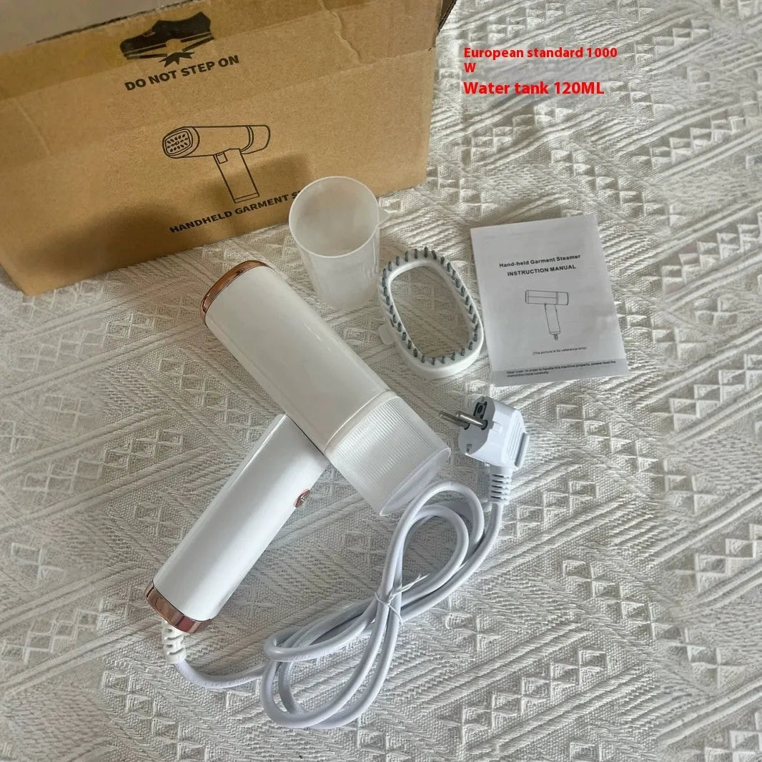 Portable handheld garment steamer in white foldable design with non-stick liner and UK plug