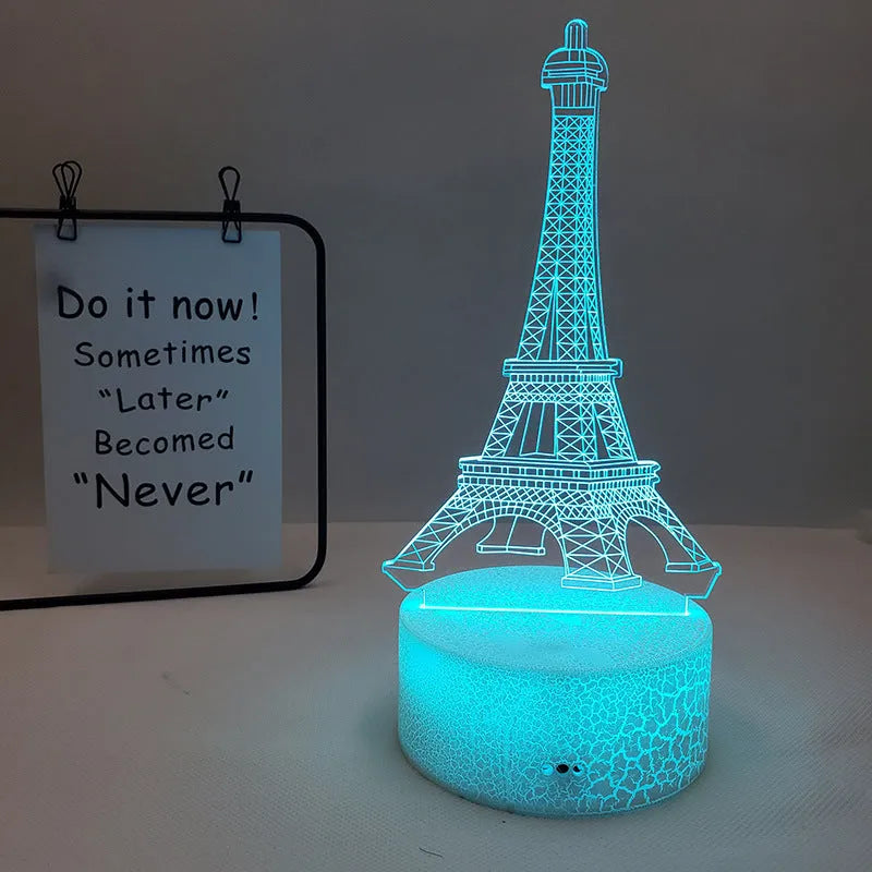 Eiffel Tower shaped 3D acrylic table lamp displaying seven colours, with touch controls and remote.