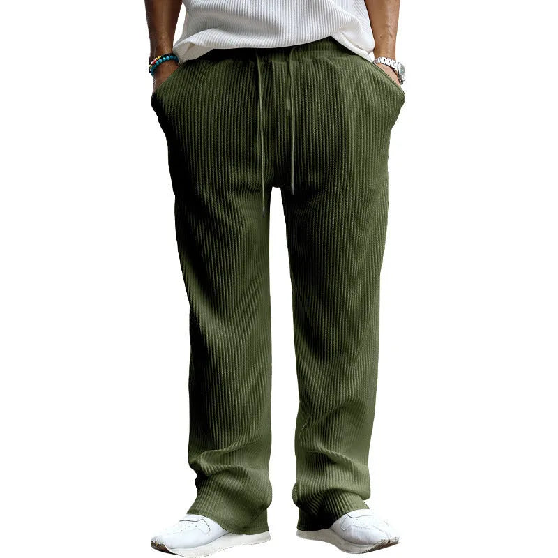 Men's loose-fit straight-leg trousers in army green with a high elastic waistband.
