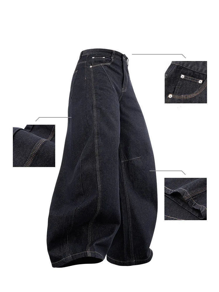 Men's wide leg denim trousers in original cow colour showing mid waist and relaxed fit.
