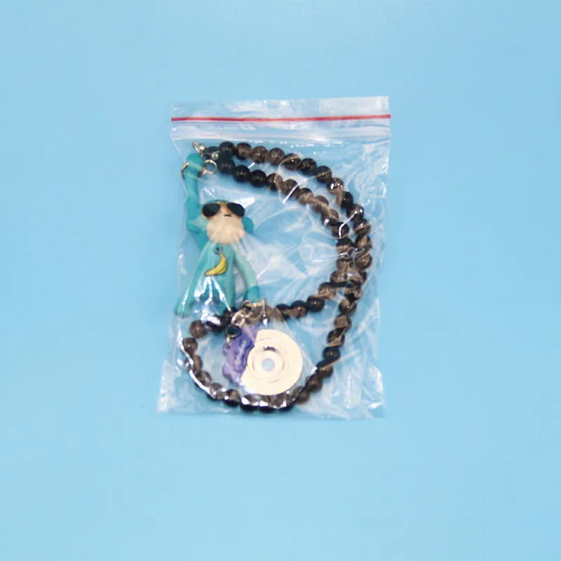 Cartoon monkey wearing sunglasses rearview mirror pendant for car decoration