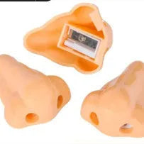 Flesh-coloured plastic manual pencil sharpener with a geometry shape and large nostril.
