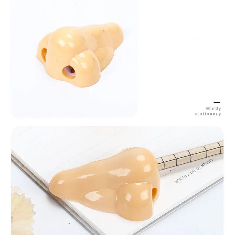 Flesh-coloured plastic manual pencil sharpener with a geometry shape and large nostril.