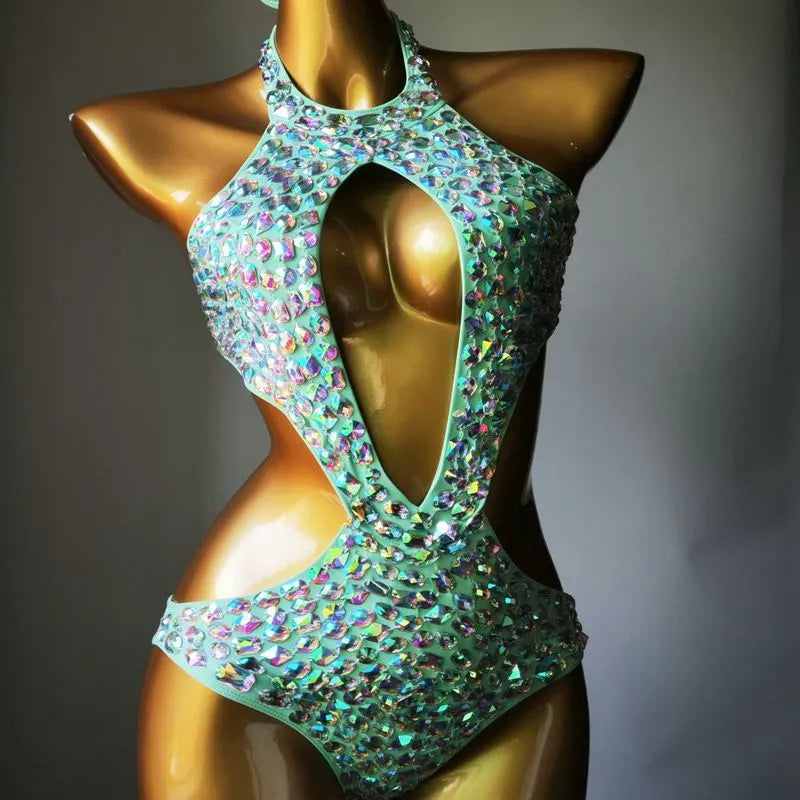 Women's one-piece swimsuit with black mesh diamond pattern on nylon fabric.