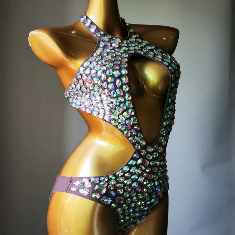 Women's one-piece swimsuit with black mesh diamond pattern on nylon fabric.