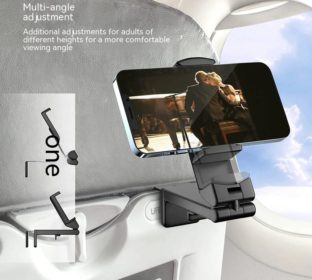 A black foldable phone holder with a rotating base, shown holding a mobile phone in landscape orientation.