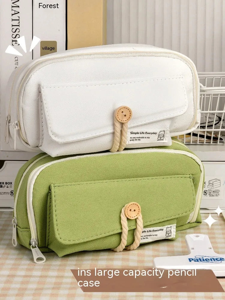 Canvas button pencil case in green, beige, blue or grey with capacity for 80 pens