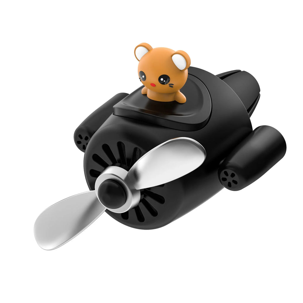 Cartoon aeroplane-shaped plastic car air vent aromatherapy diffuser with rotating fan blades.