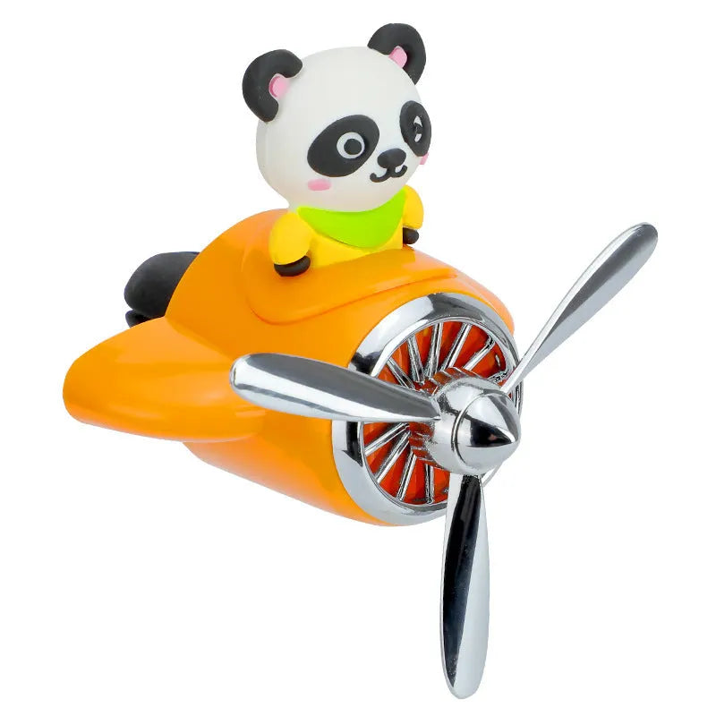 Cartoon aeroplane-shaped plastic car air vent aromatherapy diffuser with rotating fan blades.
