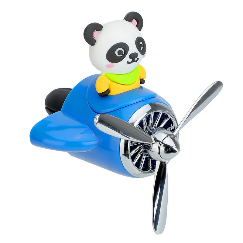 Cartoon aeroplane-shaped plastic car air vent aromatherapy diffuser with rotating fan blades.