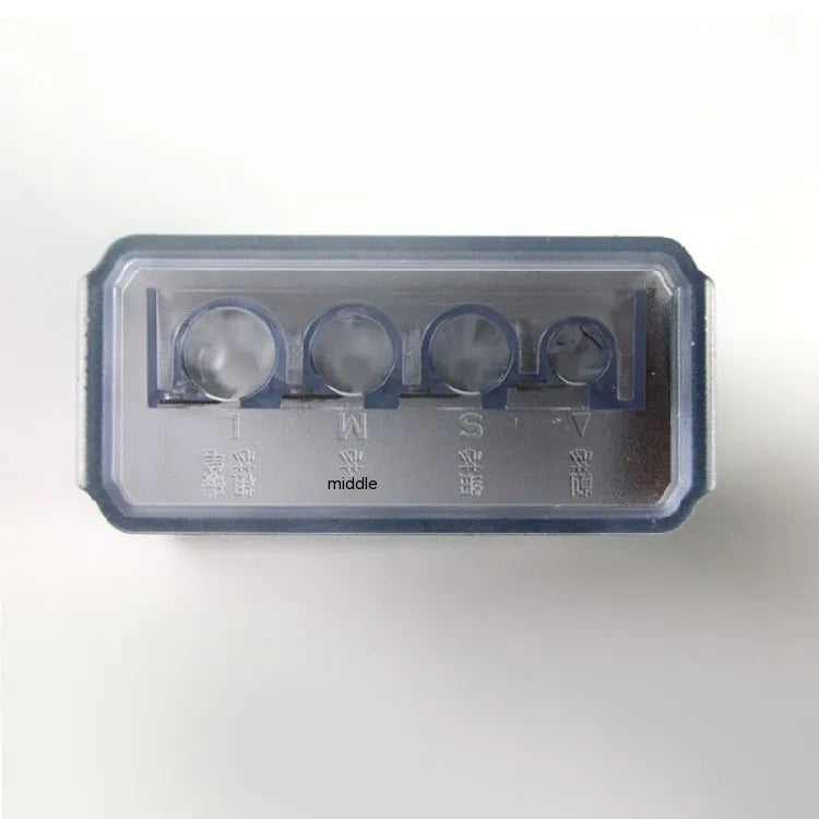 Geometric plastic pencil sharpener with four holes and an included screwdriver tool.