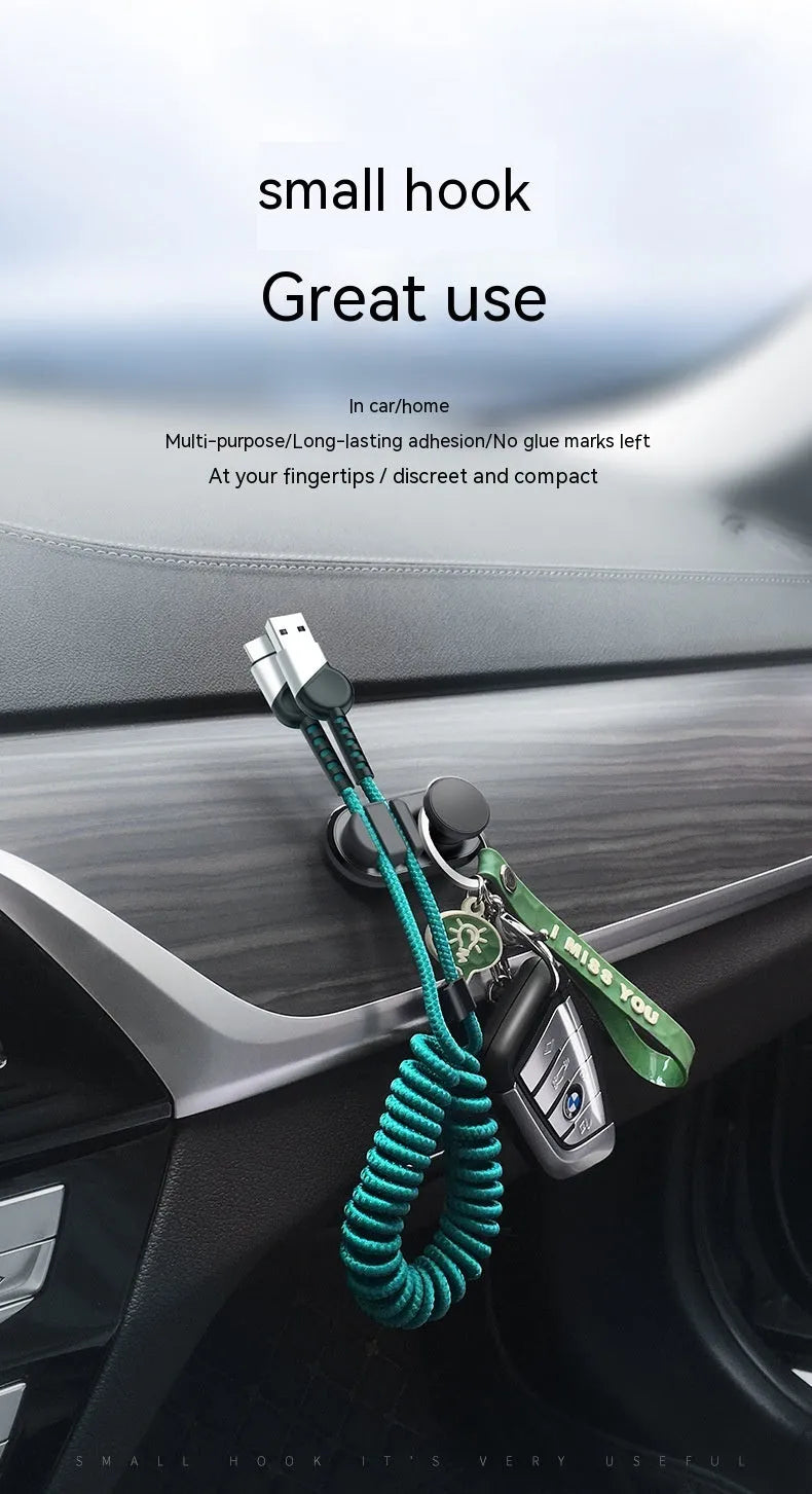 Dark green car data cable storage hook made of ABS silicone showing compact dimensions