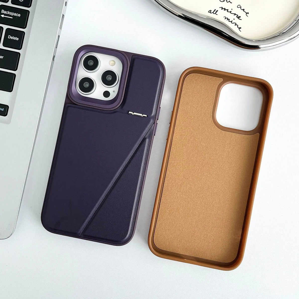 Leather hidden bracket phone case in black for Apple iPhone, featuring magnetic suction and shockproof design.