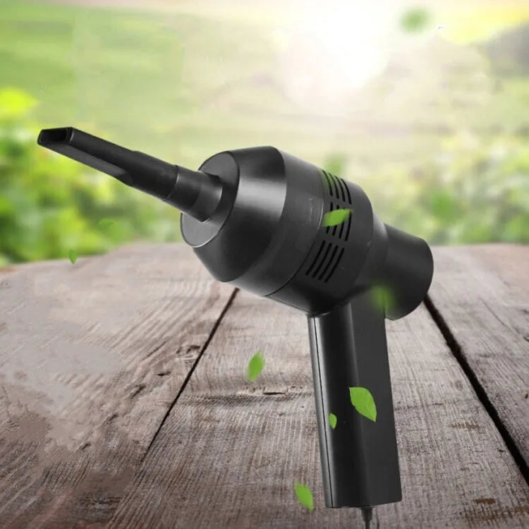 Black desktop mini vacuum cleaner with USB cable for computer keyboard and electronic dust removal