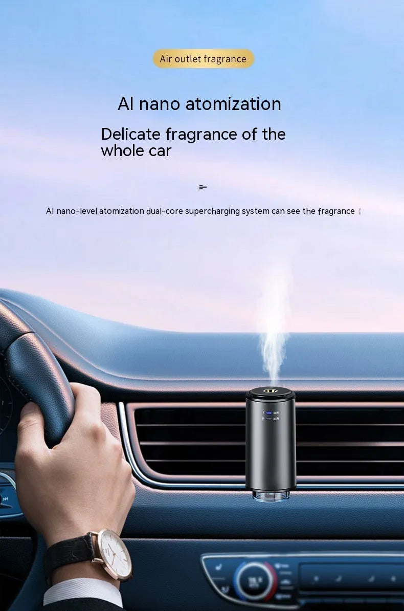 Smart car aroma diffuser clipped onto car air vent in obsidian black colour with essential oil bottles
