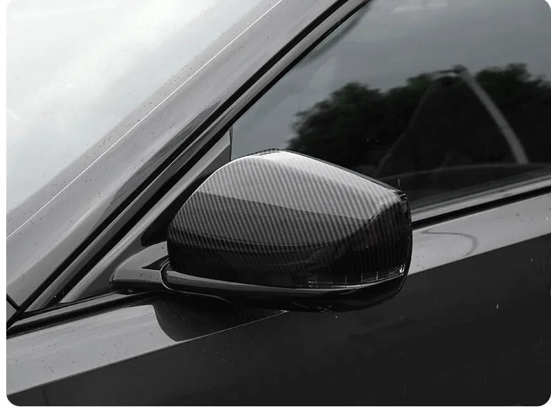 Pair of ABS rearview mirror covers for Cadillac CT5 CT6 in carbon fibre, silver, and rain frame styles.