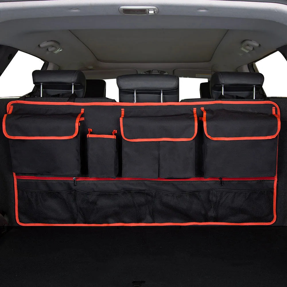 Black car boot hanging organiser bag with red piping, showing top handle and 45x40cm size.