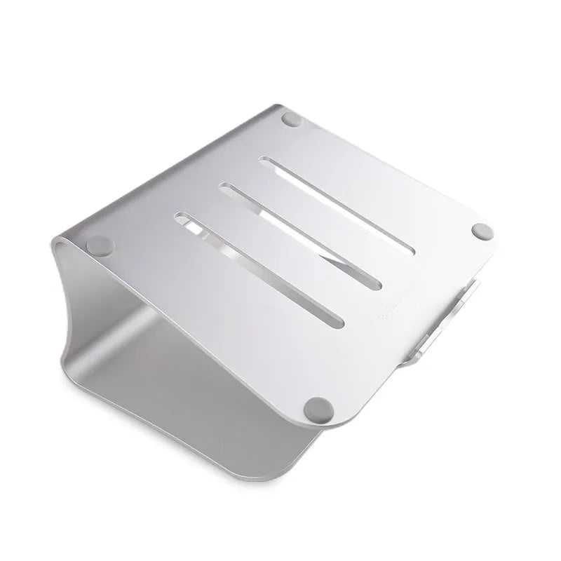 Silver aluminium laptop cooling bracket with striped texture on a wooden desk, rotated at an angle.