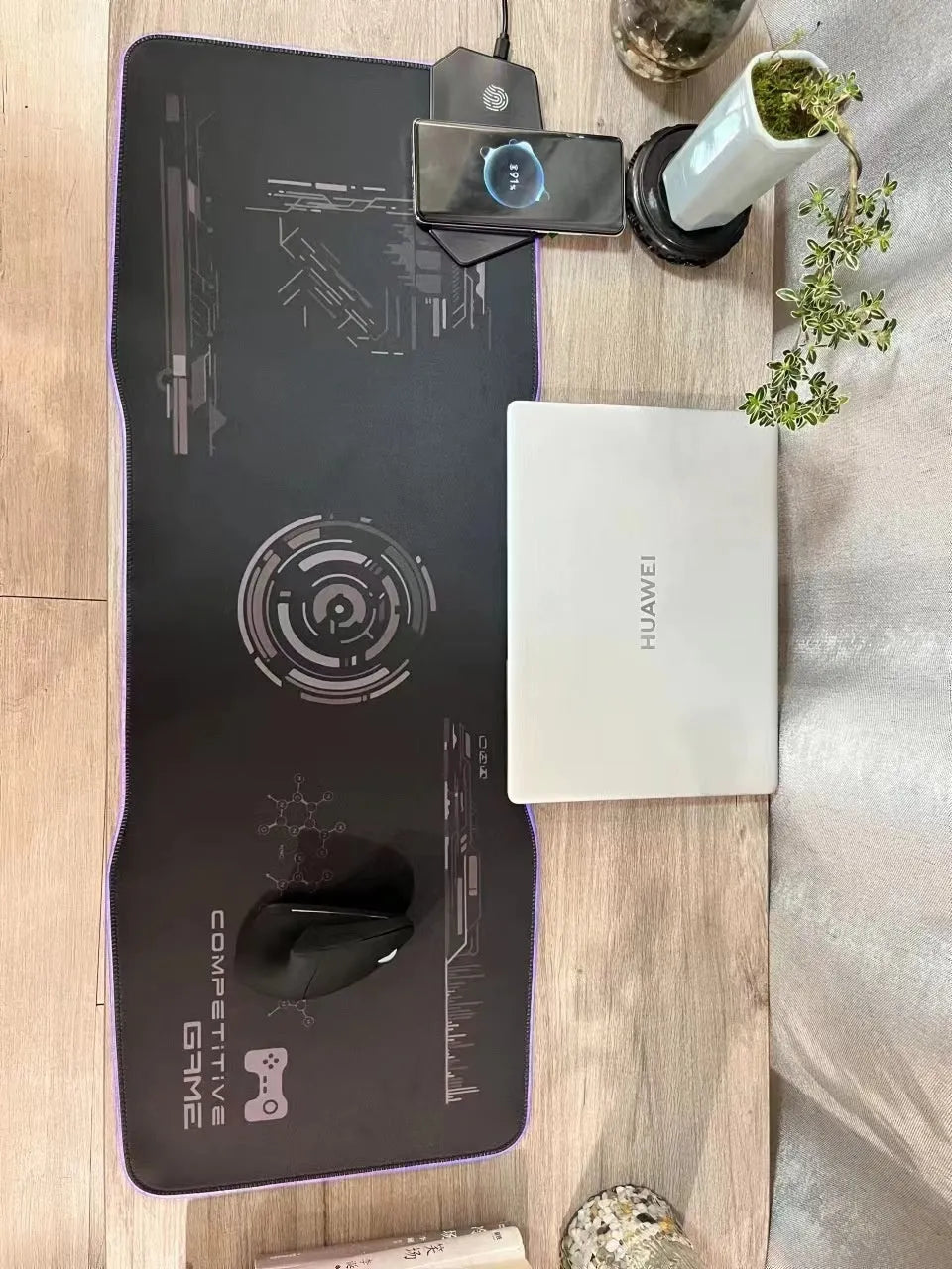 Black mech style gaming mouse mat showing luminous elements and a TYPC interface port on a large 300x800mm surface.