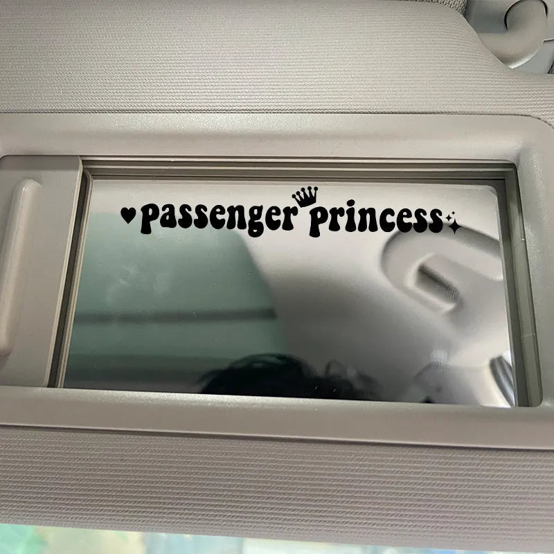 Black Passenger Princess text on a white rectangular car dashboard sticker.