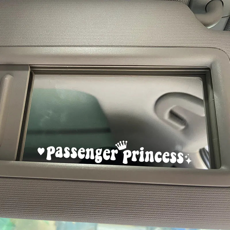 Black Passenger Princess text on a white rectangular car dashboard sticker.