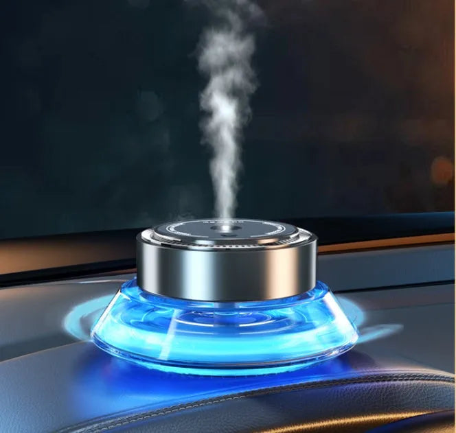 Smart spray car-mounted air freshener accessory in Gentleman's Black or Qian Shan Cui colour.