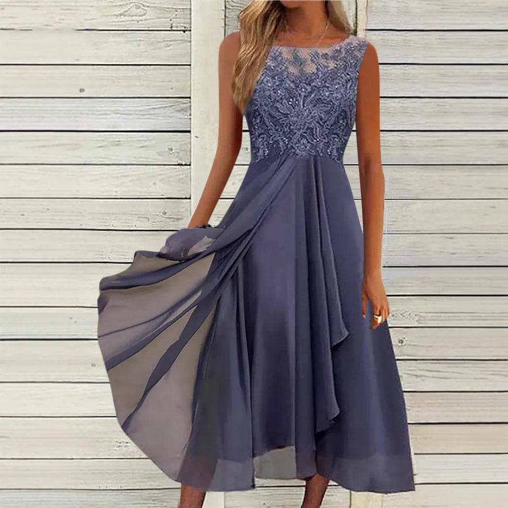 Women's sleeveless green chiffon dress with hollow-out lace detail, mid-length skirt.