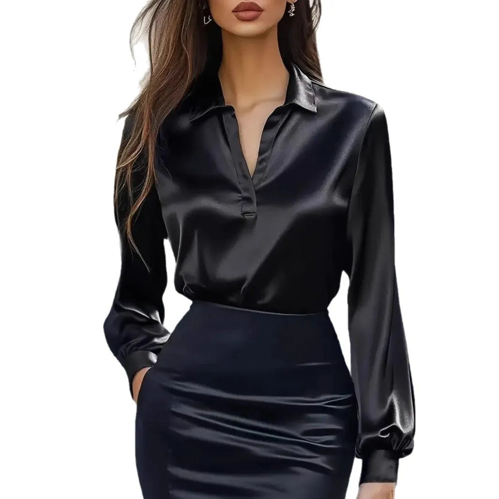 Women's black satin V-neck shirt with button patchwork front on white background