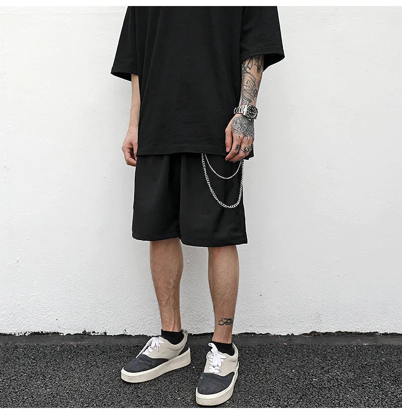 Black cotton trouser chain suit shorts for men with secure key chain, side view