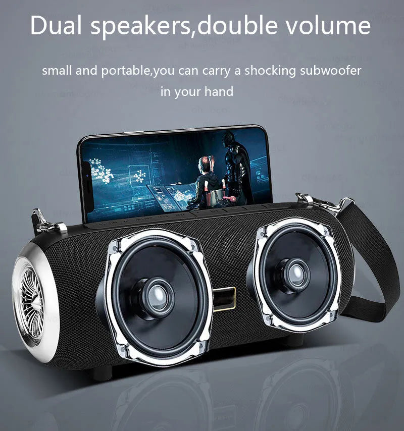 F666 mini portable Bluetooth speaker in black with fabric mesh finish, shoulder strap, and retractable FM antenna.