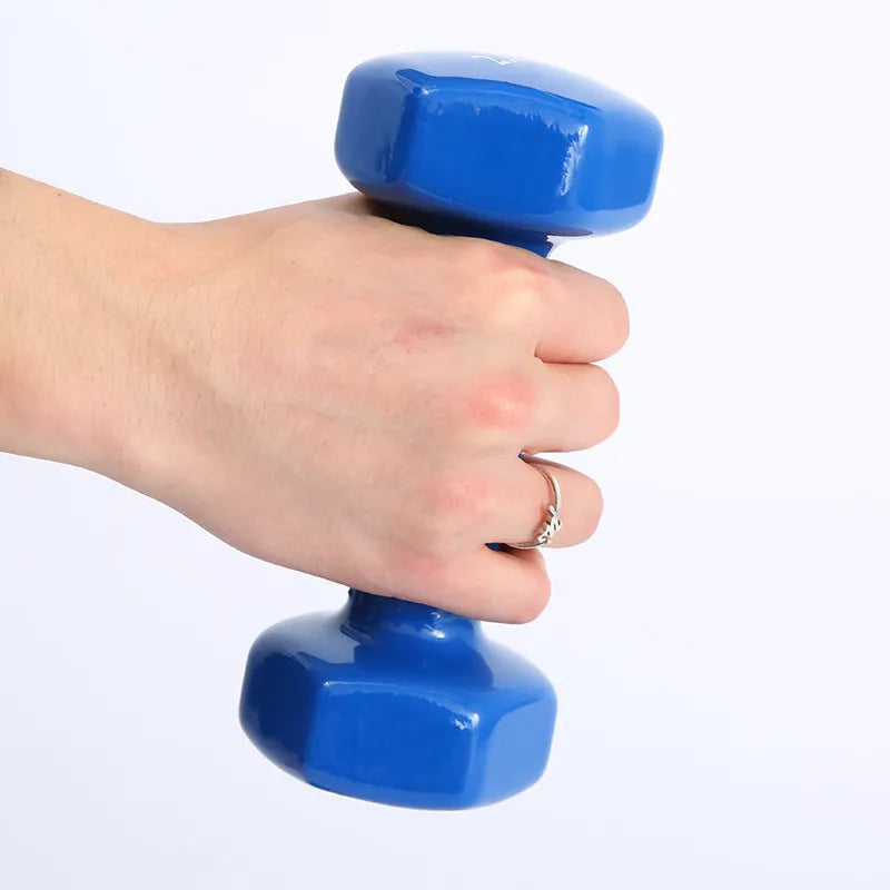Bright coloured plastic-coated fitness dumbbells for home exercise with floor protection