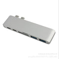 USB-C hub 109x33x10mm with dual Type-C, two USB 3.0 ports, SD and Micro SD slots, grey or silver