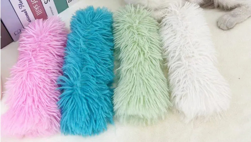 Cat plush toy pillow in blue, green, pink, or white colours measuring 27cm by 10cm