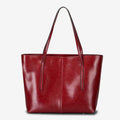 Women's genuine leather shoulder bag with retro styling and multiple internal compartments