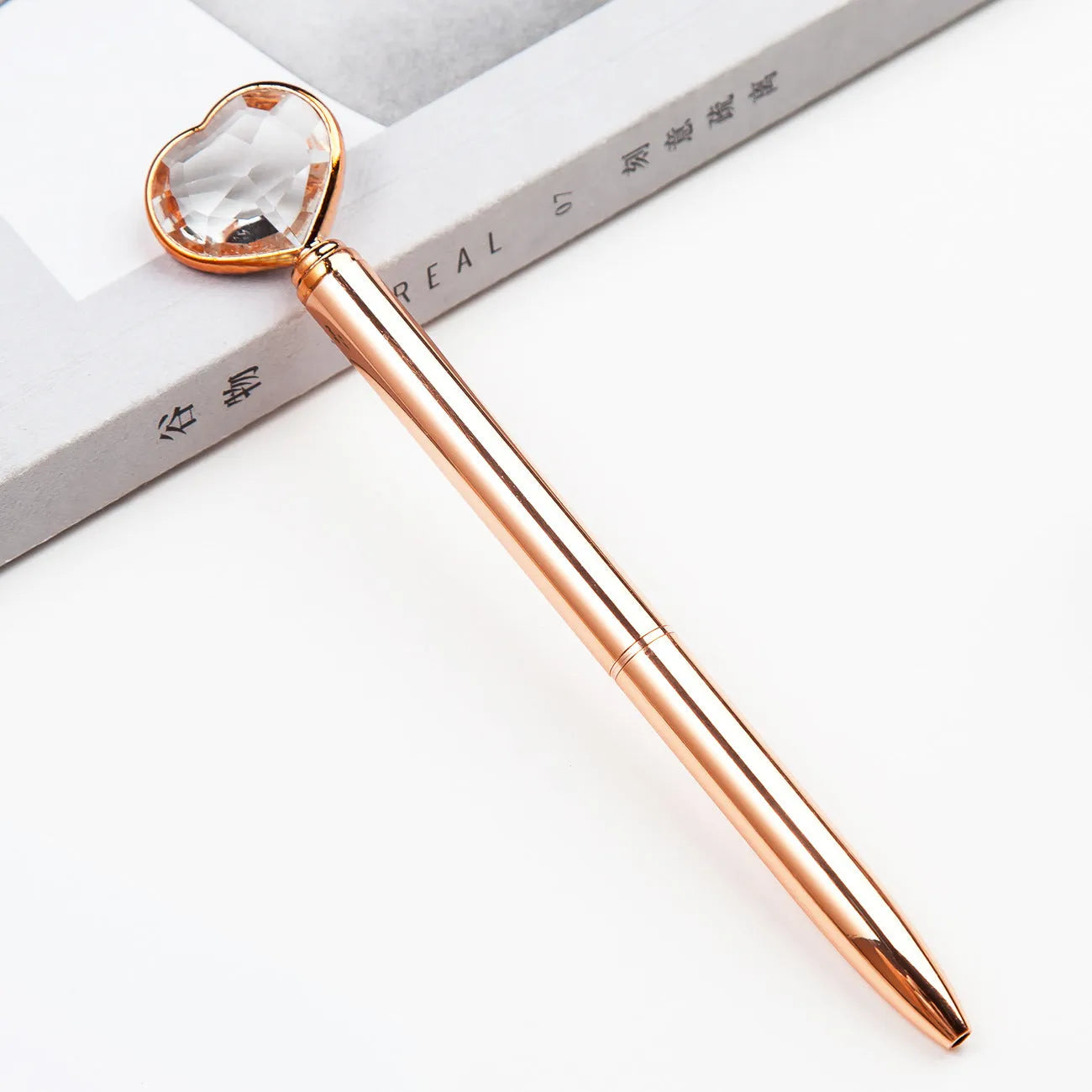 Creative Crystal Love Ball Metal Pen in golden, rose gold, or silver colour with crystal detail