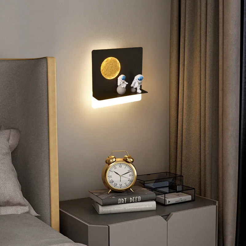 Astronaut-shaped bedside wall lamp with small shelf in black or white round or square design