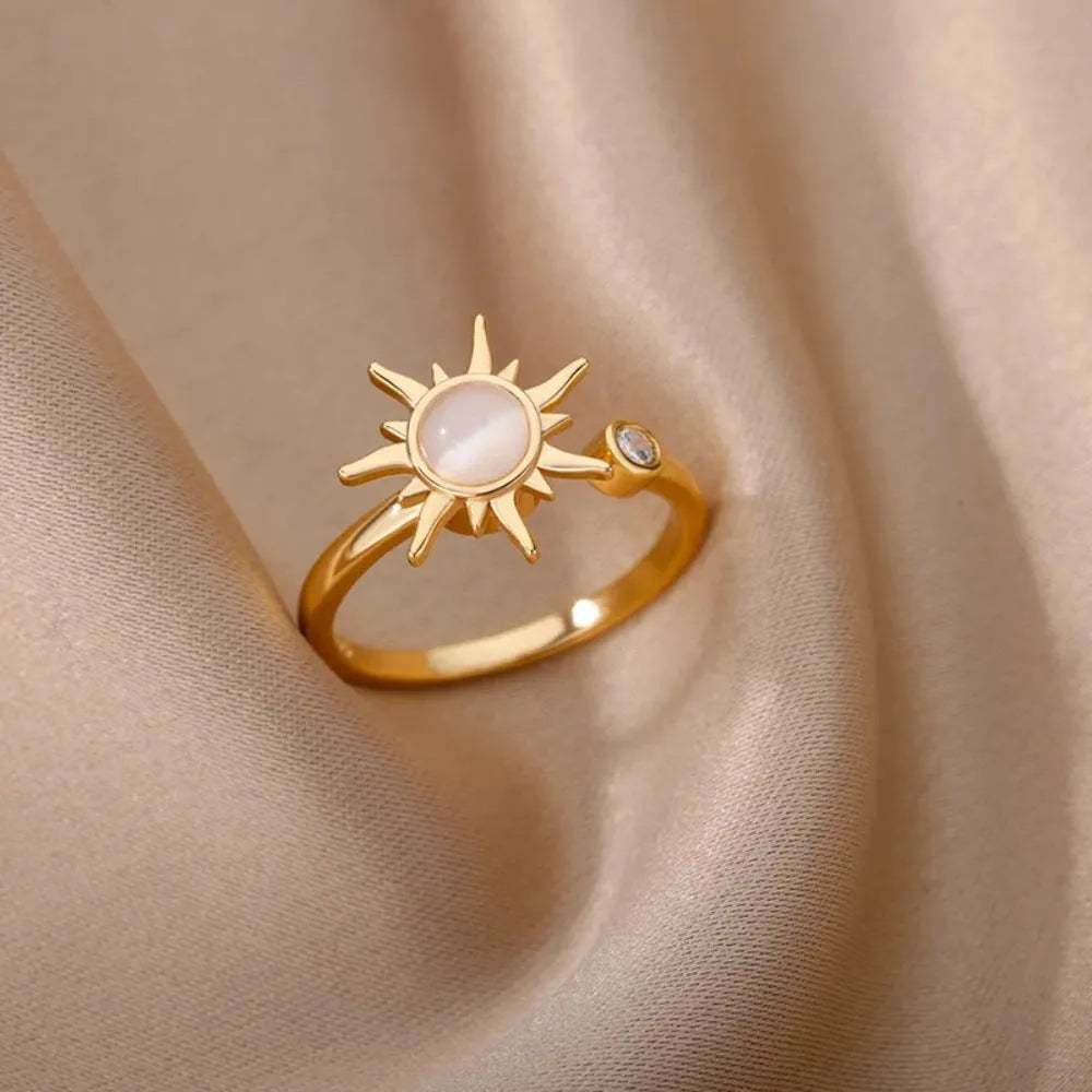 Geometric rotatable ring with adjustable opening in gold electroplated finish on copper base