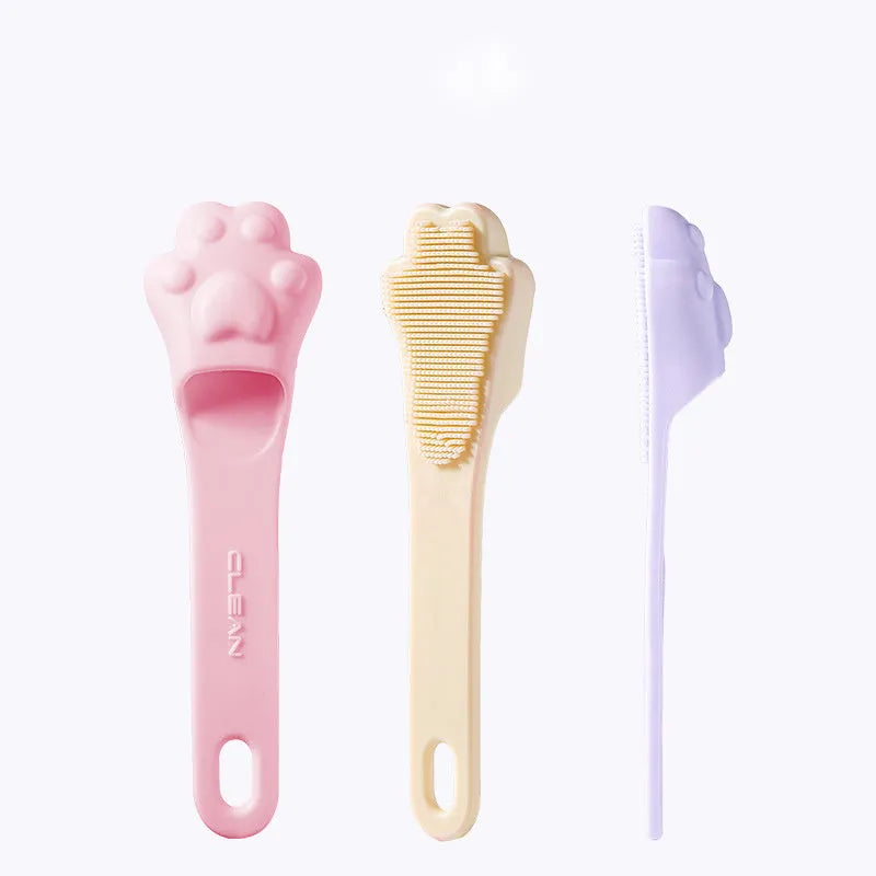 Silicone finger toothbrush for pets in pink, purple, and yellow colours