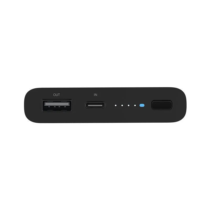 Black and white 10000mAh power bank with fast charging and wireless output features.