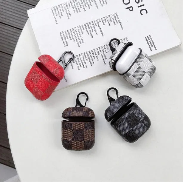 Black leather grid hard shell protective case for iPhone XS Max with anti-lost hook for Bluetooth headset.