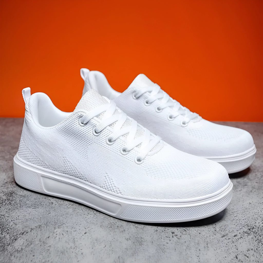 Unisex casual sports shoes with thick EVA sole and mesh upper in black and white colour options