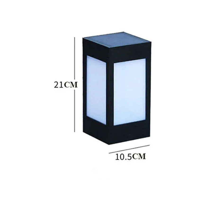 Set of solar-powered LED garden lights in various styles illuminating an outdoor patio at dusk.