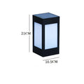Set of solar-powered LED garden lights in various styles illuminating an outdoor patio at dusk.