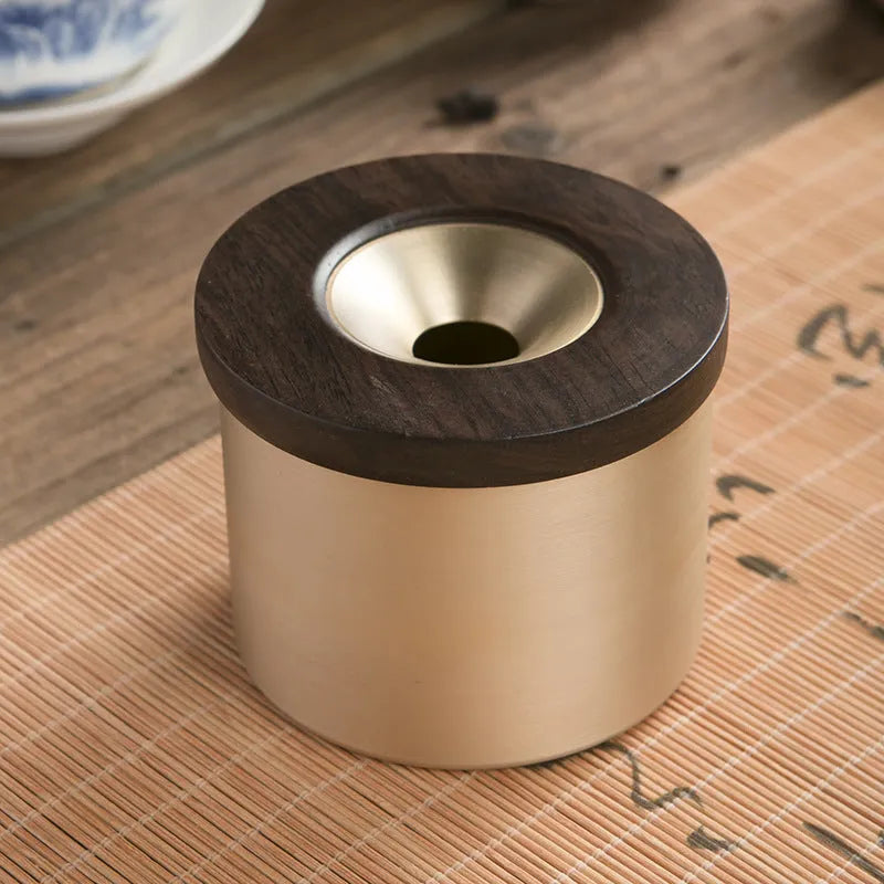 Retro brass ashtray with wooden lid in copper construction for living room use