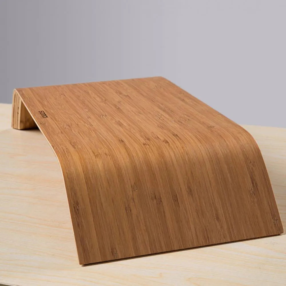Walnut laptop stability bracket stand in bamboo leather colour on a desk