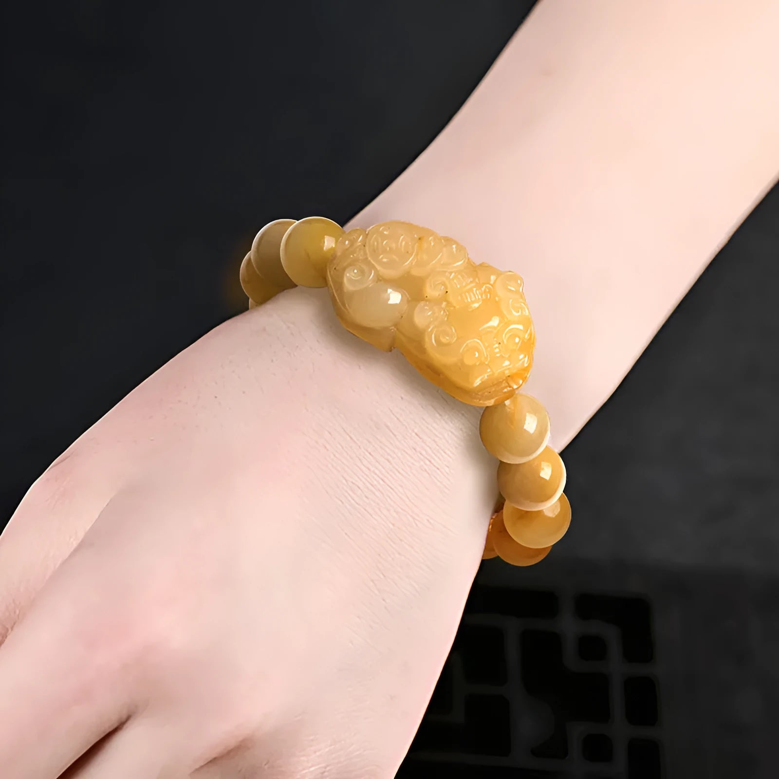 Carved Jinsi Jade Money bracelet showing large and small size options with measured jade beads.