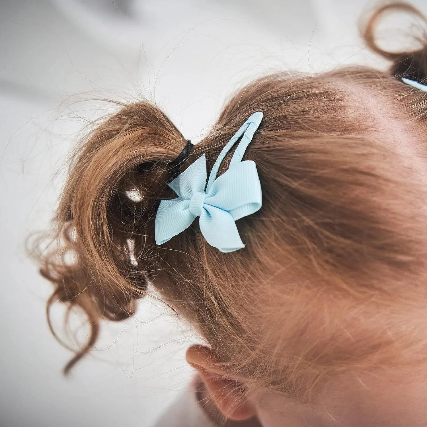 40 piece set of grosgrain ribbon baby hair bows with fully wrapped snap clips in multiple solid colours