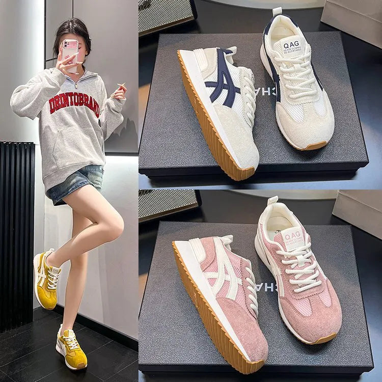 Women's white casual lace-up sneaker with non-slip sole on neutral background