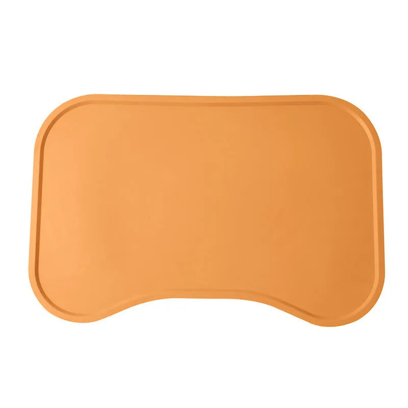 Waterproof silicone dog food mat with raised edges in green colour, non-slip base for pet bowls