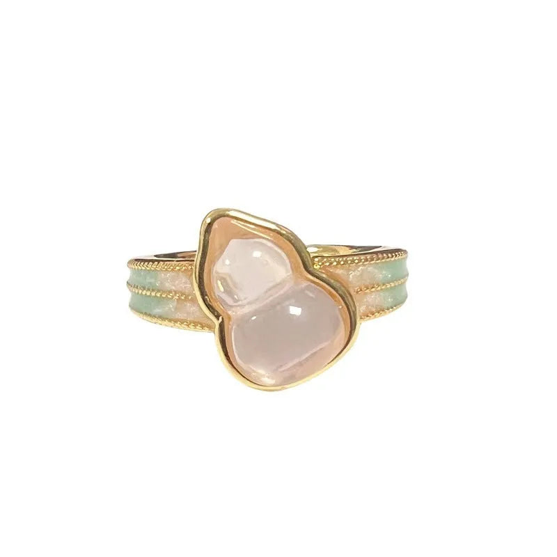 Copper adjustable vintage gourd ring with floral bow design and inlaid zircon stones.